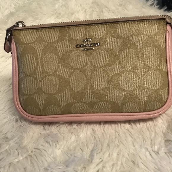 Coach Handbags - Pink clutch coach gently used